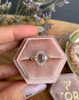 Purple Haze Diamond Ring with an Oval Cut Amethyst