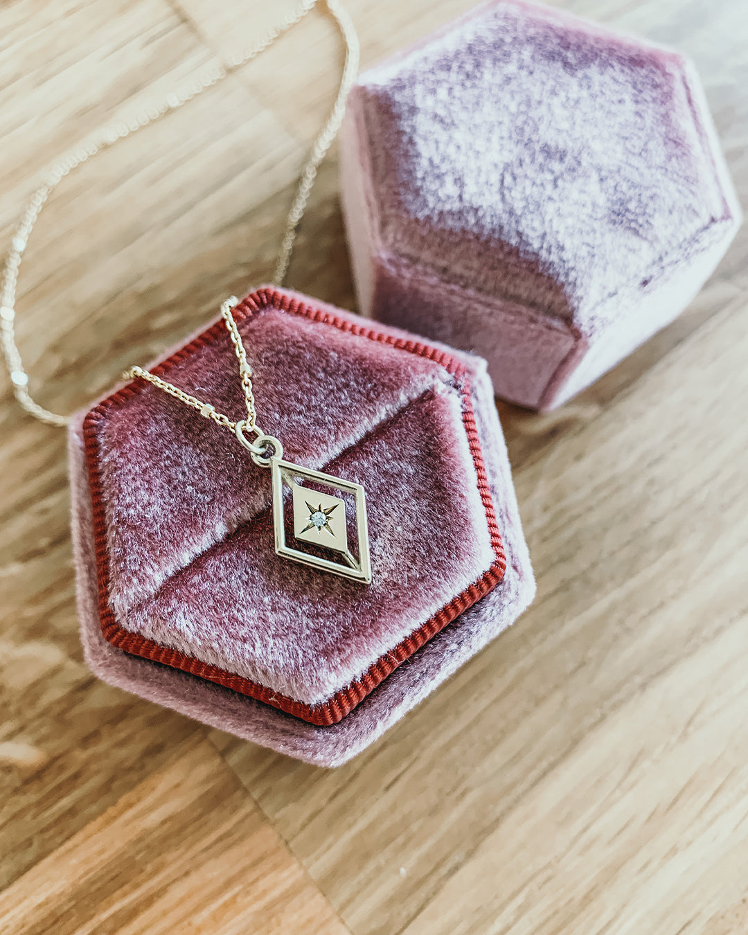 Grace Kite Shaped Gold Pendent with a Tiny Diamond