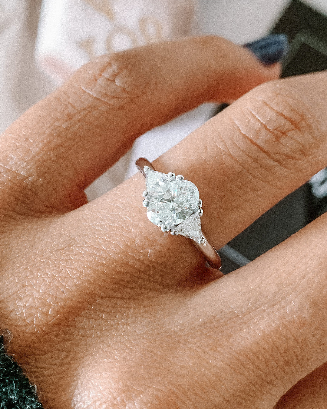 Niva Engagement Ring with Oval Cut and Triangle Cut Natural Diamonds