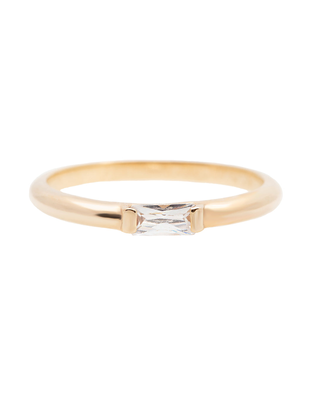 A 14k yellow gold engagement ring, set with a 0.25 baguette cut white diamond. 